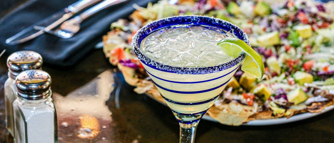 Classic Rosa Mexicano margarita on the rocks with a salted rim and lime.